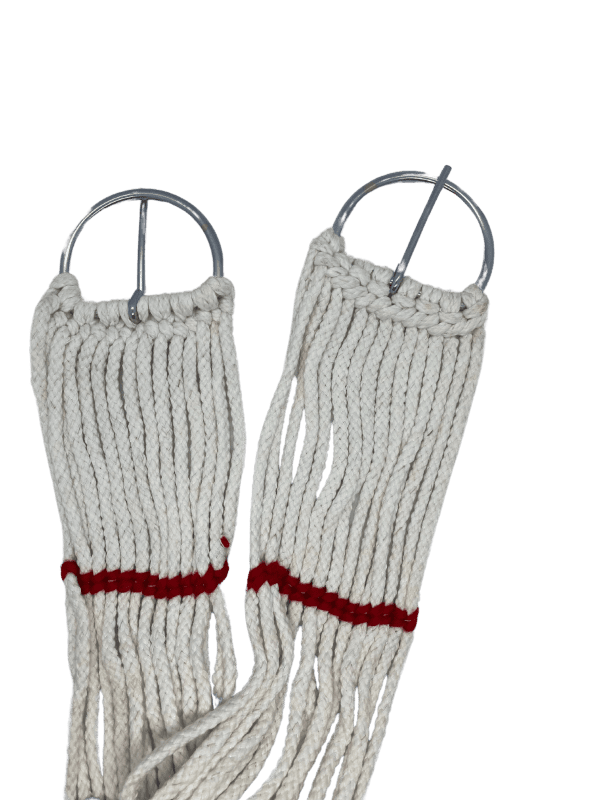 Soft cord material of horse girth showing flexibility.
