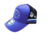 Side view of purple kids trucker cap with purple and white side stripe, white logo embroidery, and black mesh back by Outback Clothing Co.