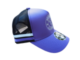 Right side view of purple kids trucker cap with purple and white side stripe, white logo embroidery, and black mesh back by Outback Clothing Co.