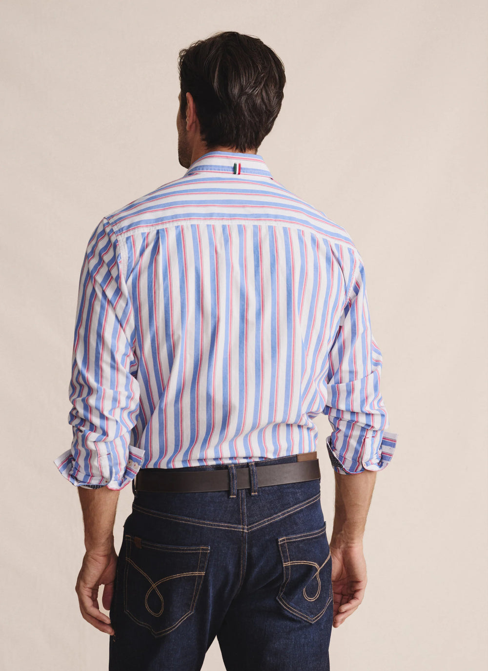 Rear view of S. Kidman Dexter Long Sleeve Shirt in mid blue showing pleated back yoke and longer back tail for added comfort and fit.