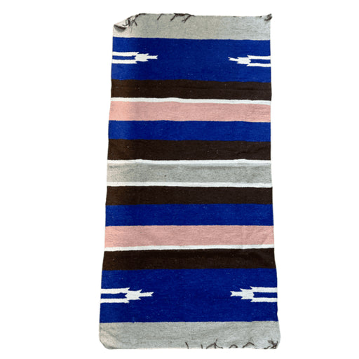 Detailed view of handwoven Navajo-style horse saddle pad