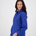 Rich blue hue and breathable cotton texture in Outback Clothing Co's women's half-button long-sleeve shirt