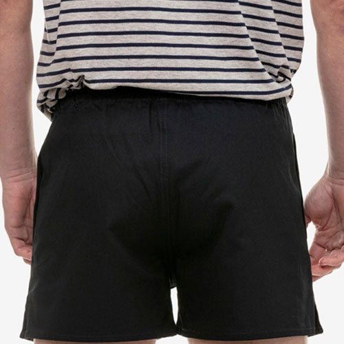 Back view of men's cotton navy rugby short featuring rear pocket and drawcord waistband.