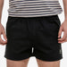Front view of men's cotton navy rugby short with elastic waistband and deep side pockets.