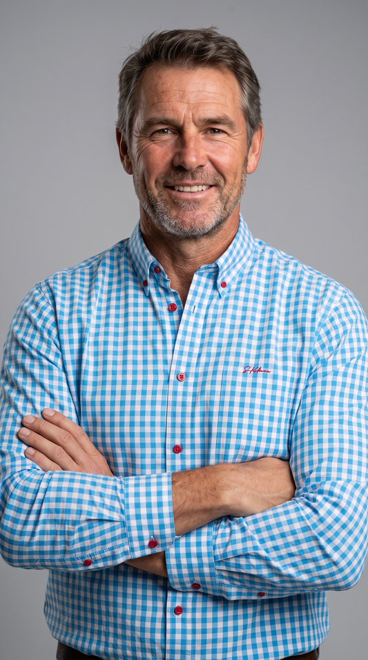 Model wearing S.Kidman Holstein Long Sleeve Shirt in Pale Blue gingham, front studio view.
