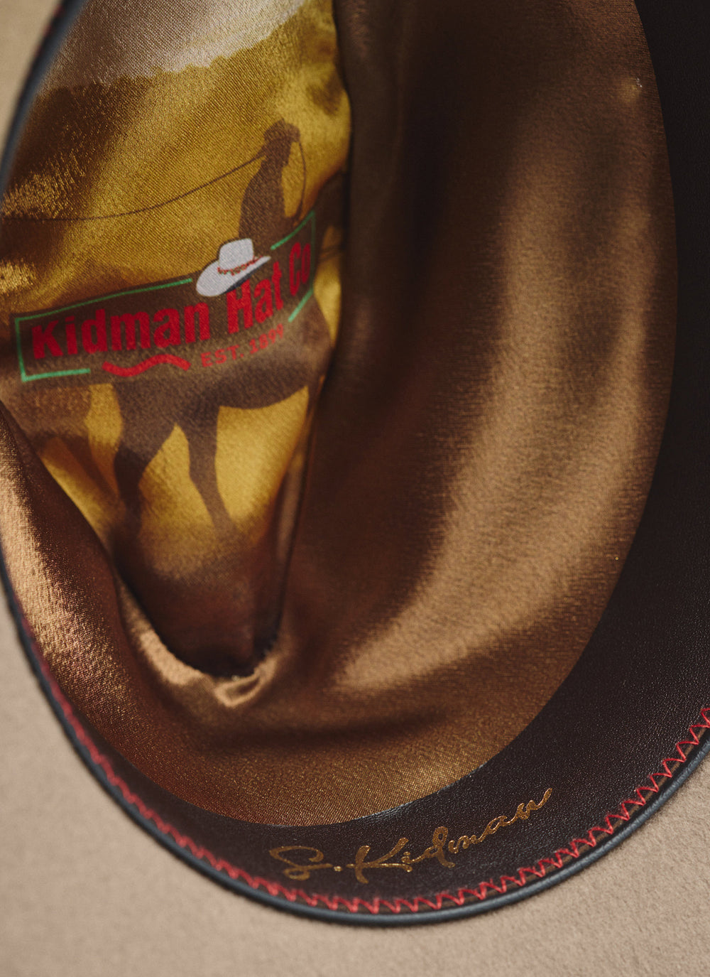 Inside view of Kidman Drover Hat in Brown, featuring premium leather sweatband and Merino wool lining