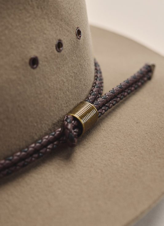 Side profile of Kidman Drover Hat in Brown, highlighting wide brim and soft leather sweatband