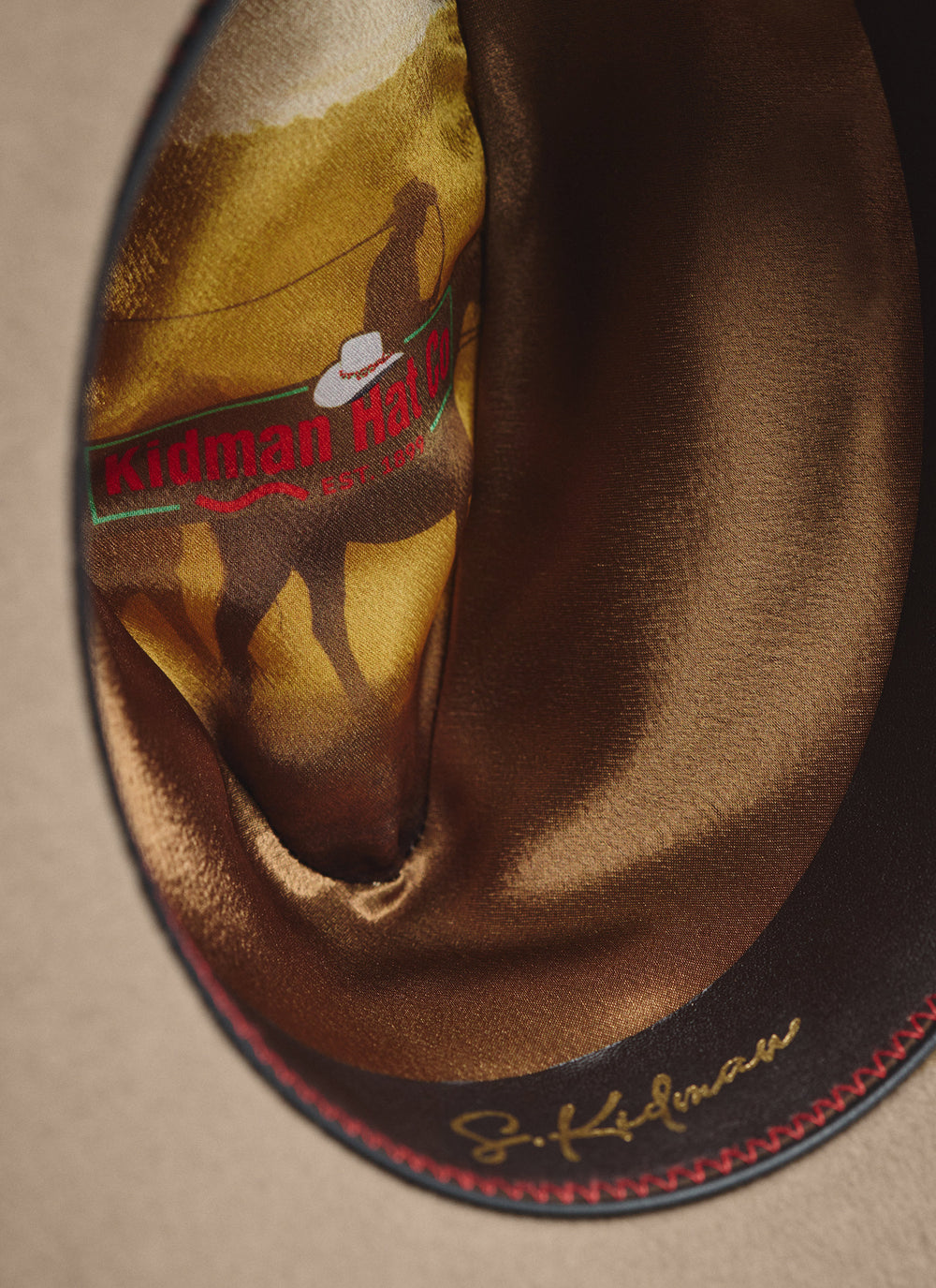 Inside view of Kidman Drover Hat in Stone, showcasing premium leather sweatband and Merino wool lining.