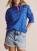 Front view of the S. Kidman Camfield Half Placket Work Shirt in mid blue, featuring button-up half placket and chest pockets.