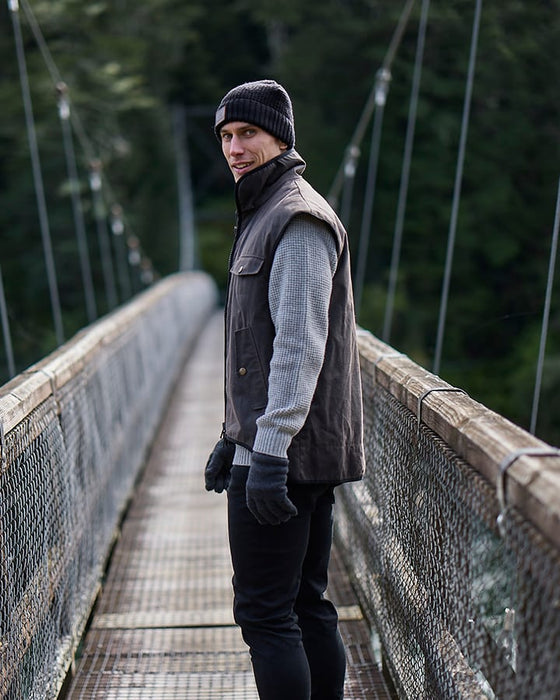 Side profile of the Levels Oilskin Vest SSD2802, showing the fit across the torso and extended shoulder seams