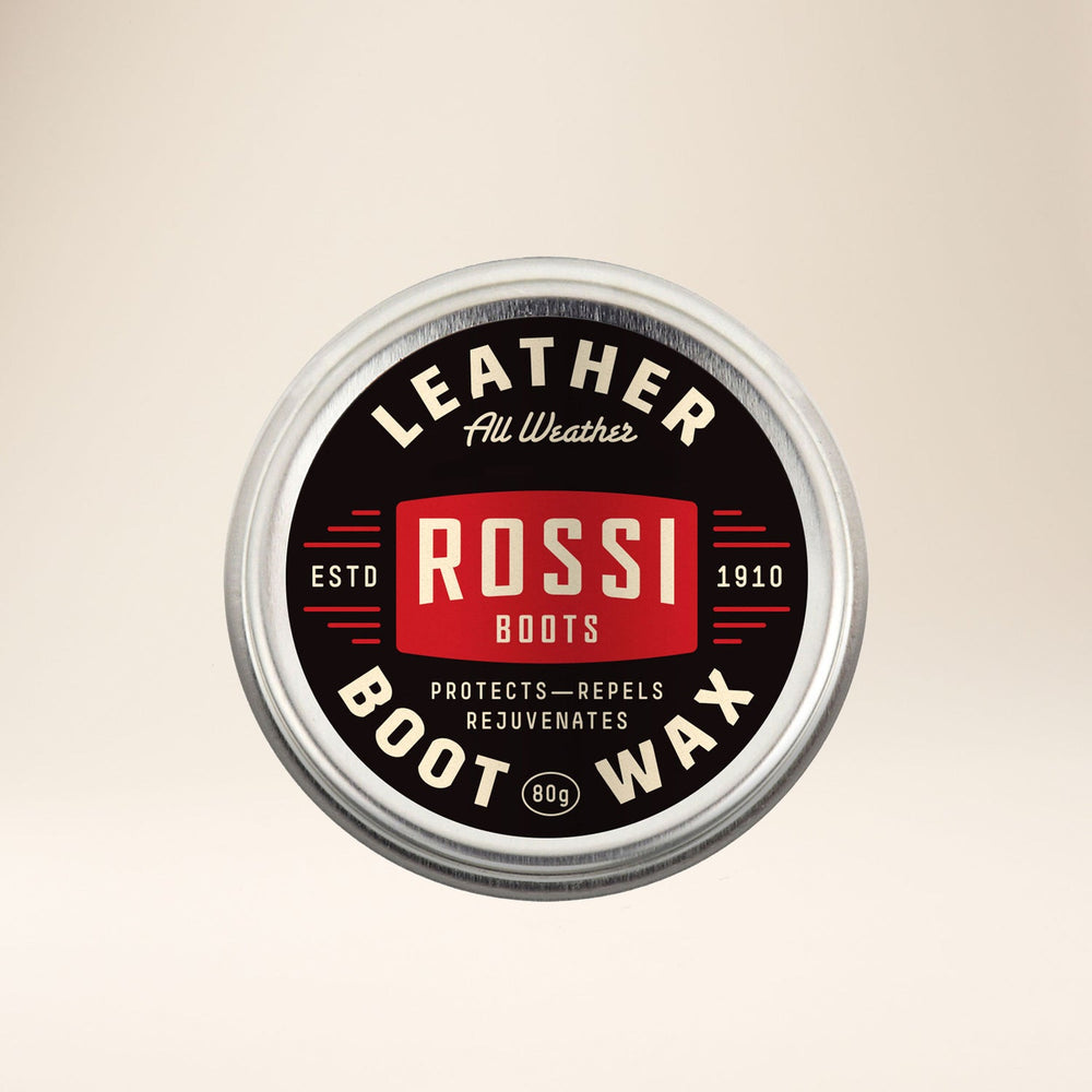 Outback Leather Boot Wax jar with lid removed, showcasing natural wax texture.