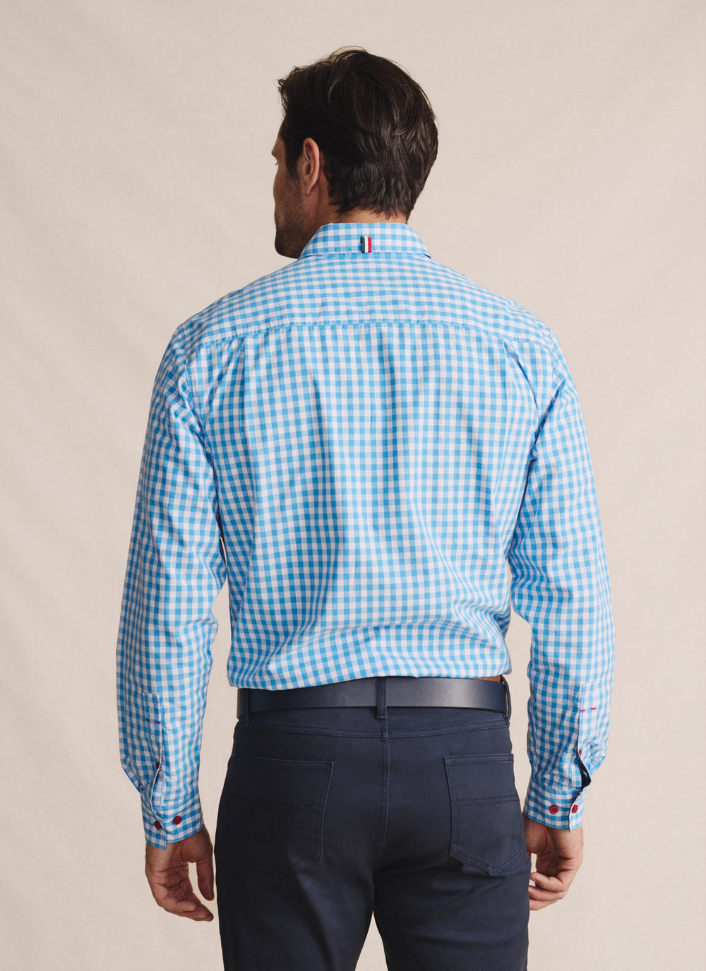 Back view of the S.Kidman Holstein Long Sleeve Station Shirt in Pale Blue showing pleated back yoke and longer tail.