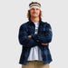quirky model with crossed arms, close-up of blue flannel fabric