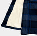 Close-up of soft Sherpa lining and blue flannel fabric