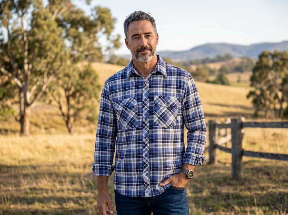 Man wearing Swanndri Egmont Bluebird Bronze brushed cotton flannel shirt outdoors in rural Australia