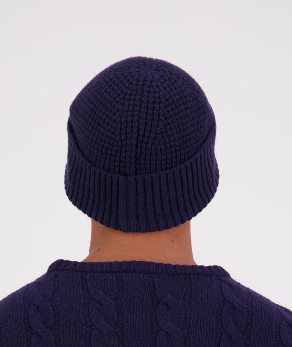 Back view of Swanndri Newton Beanie in blue – ribbed knit wool design and smooth finish.