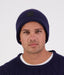 Swanndri Newton Beanie in blue – front view showing ribbed knit texture and cuff.
